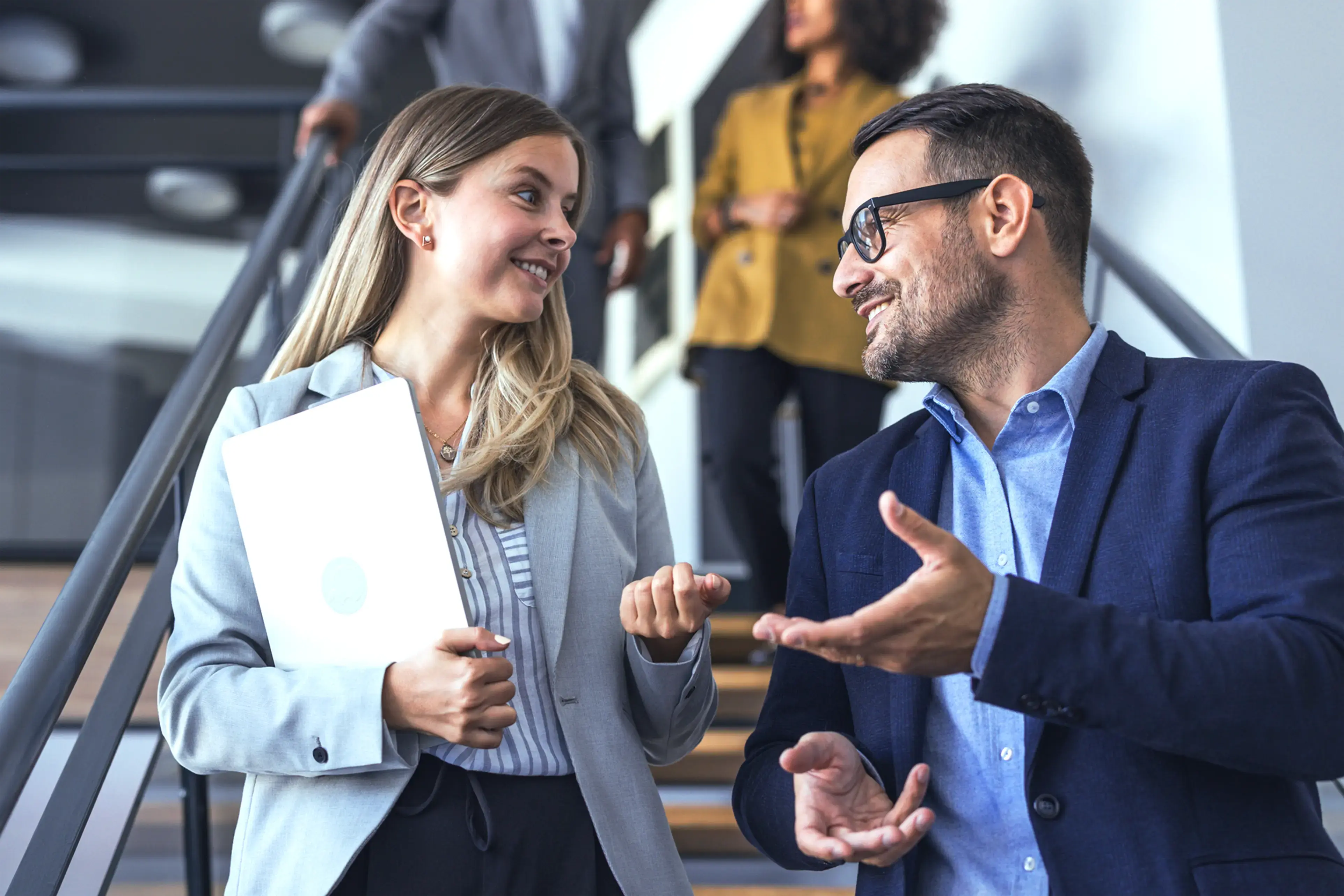 Business professionals discussing work